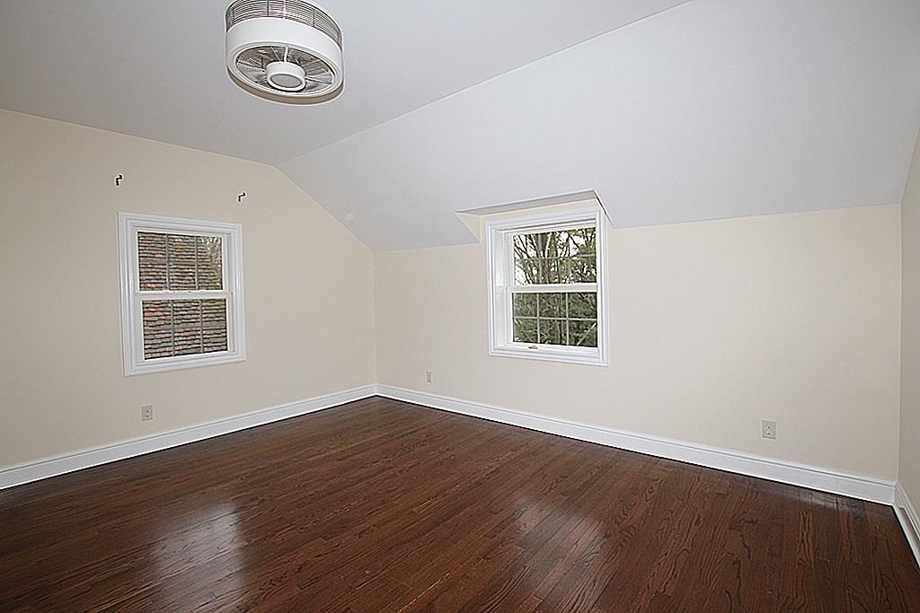764 Osage Road Mt. Lebanon, PA 15243 - Photo 14 of 24 2nd bedroom with hardwood floors and paddle fan.