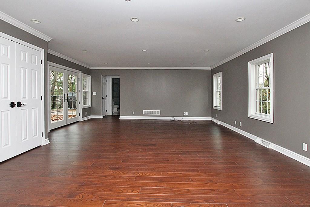 764 Osage Road Mt. Lebanon, PA 15243 - Photo 8 of 24 The first floor family room offers recessed light, crown molding and a large storage closet . Access thru the French doors to a private deck.