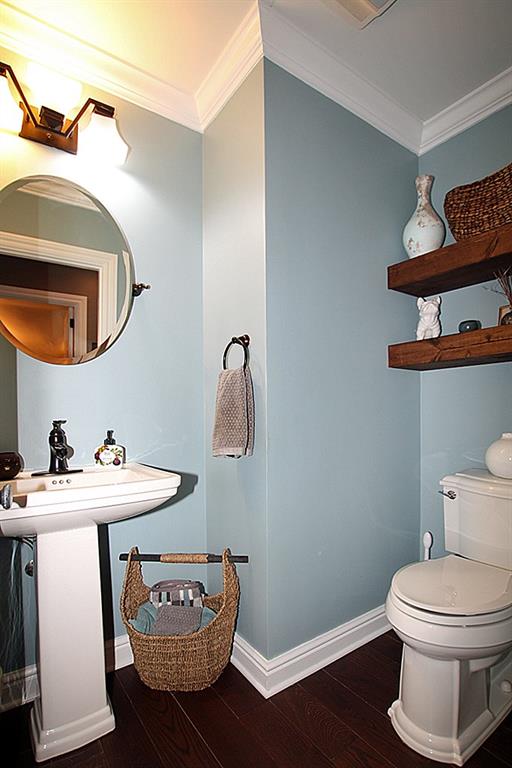 764 Osage Road Mt. Lebanon, PA 15243 - Photo 10 of 24 1st Floor Powder Room with built in shelves, hardwood floors and crown molding.