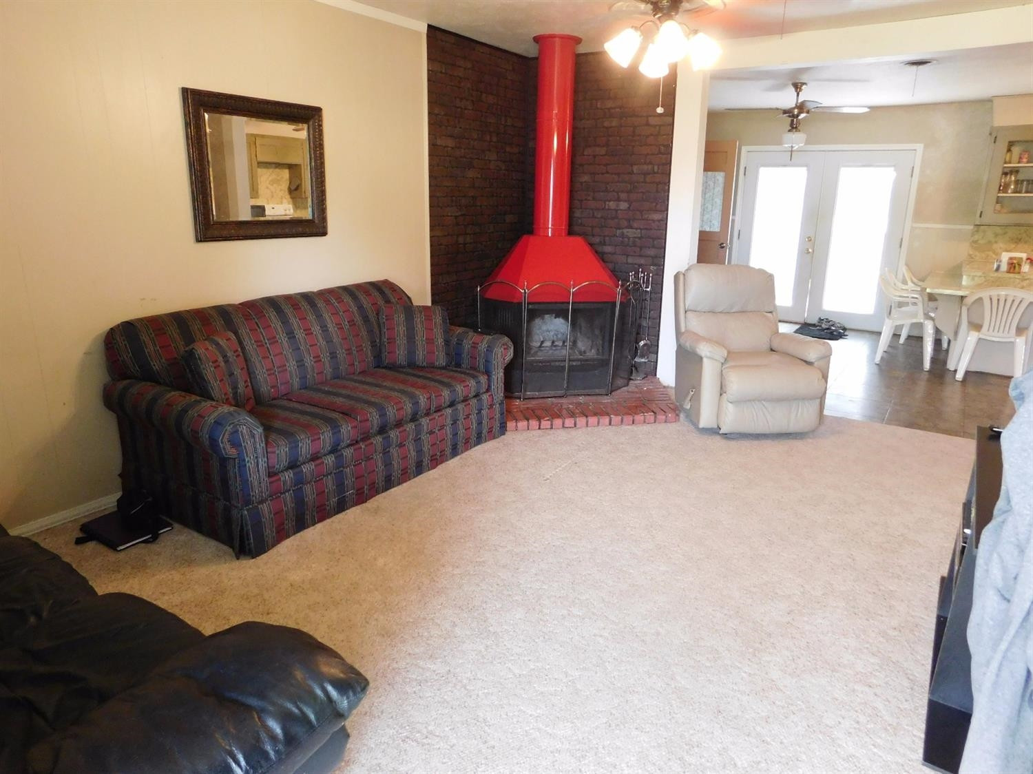 904 West 7th Street Muleshoe, TX 79347 - Photo 2 of 10 a living room with furniture and a large window