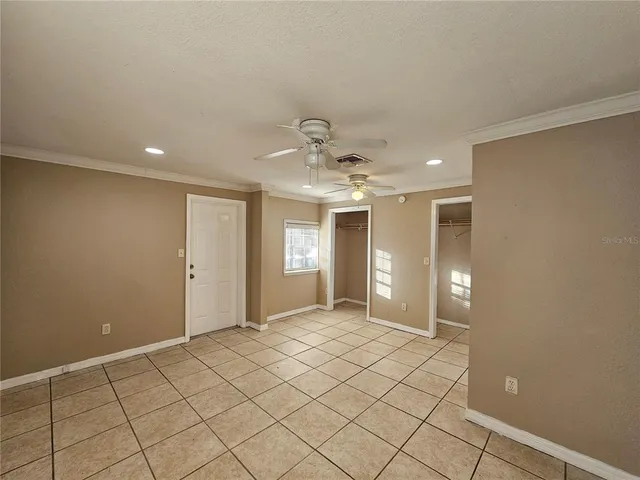 a view of an empty room and window