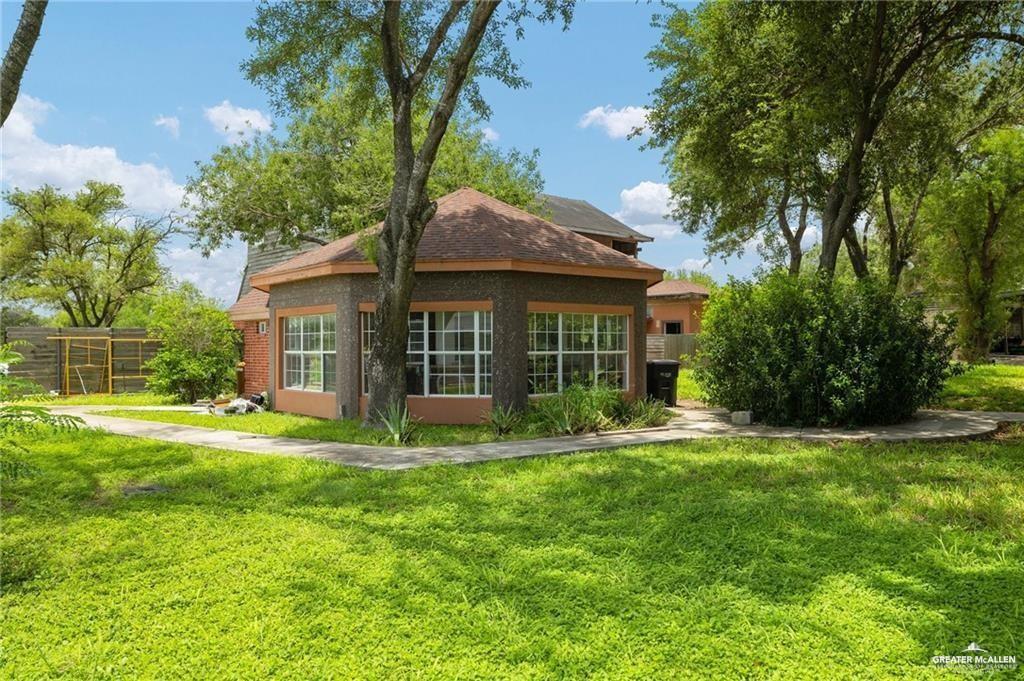 4523 South Tower Road Edinburg, TX 78542 - Photo 29 of 32 a front view of a house with a yard