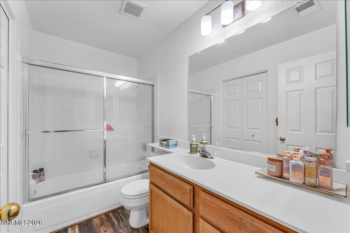 10 Eagle Claw Court Reno, NV 89523 - Photo 27 of 36 a bathroom with a sink a toilet and shower