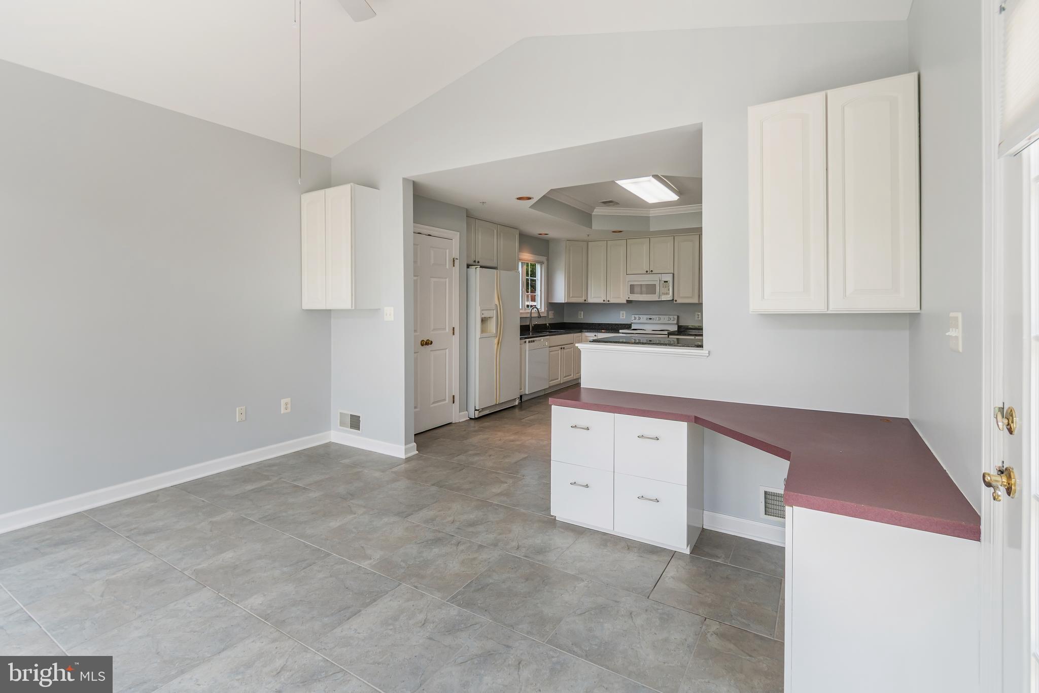 314 Colony Point Place Edgewater, MD 21037 - Photo 23 of 31 a large kitchen with cabinets and stainless steel appliances