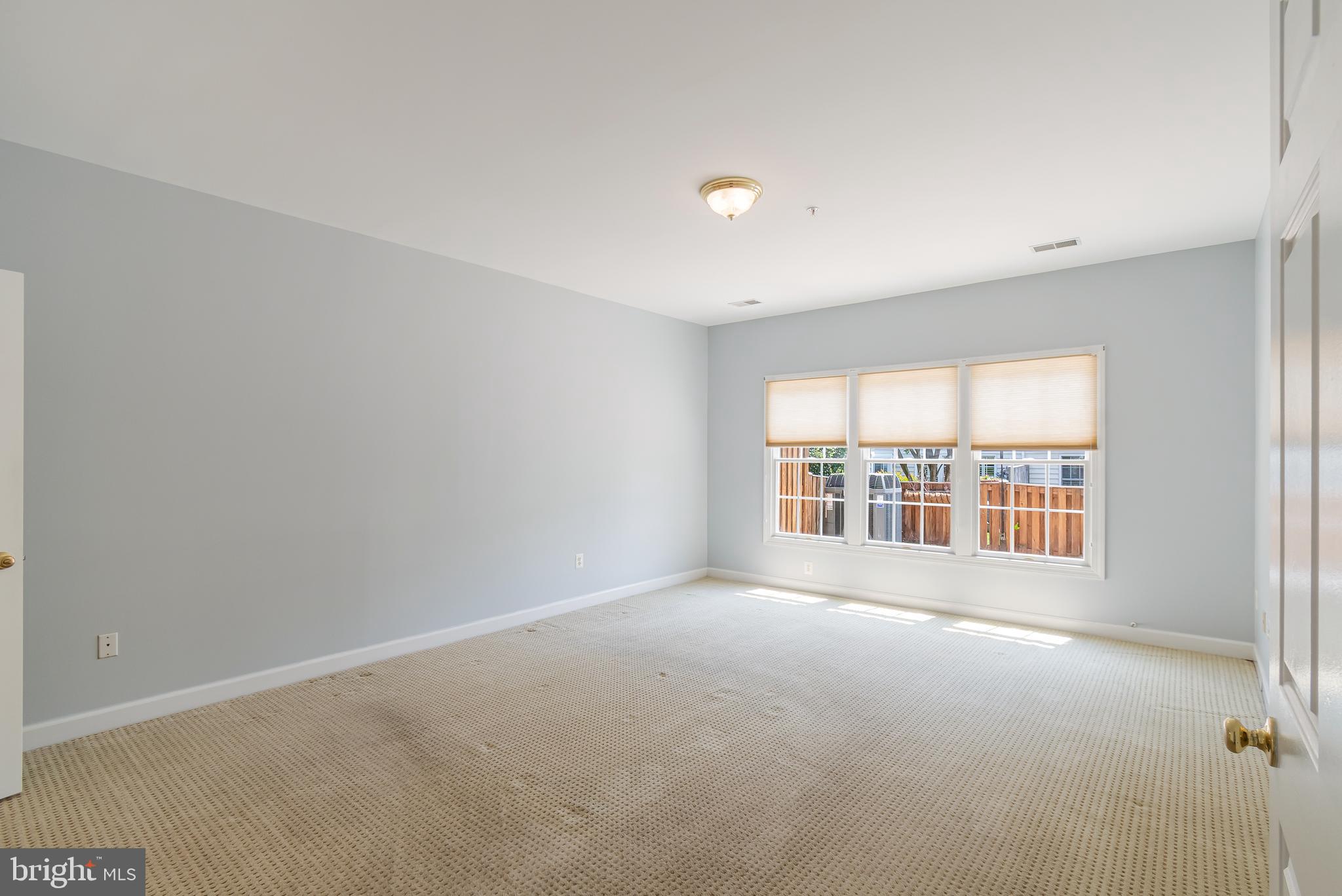 314 Colony Point Place Edgewater, MD 21037 - Photo 24 of 31 an empty room with a empty space and windows