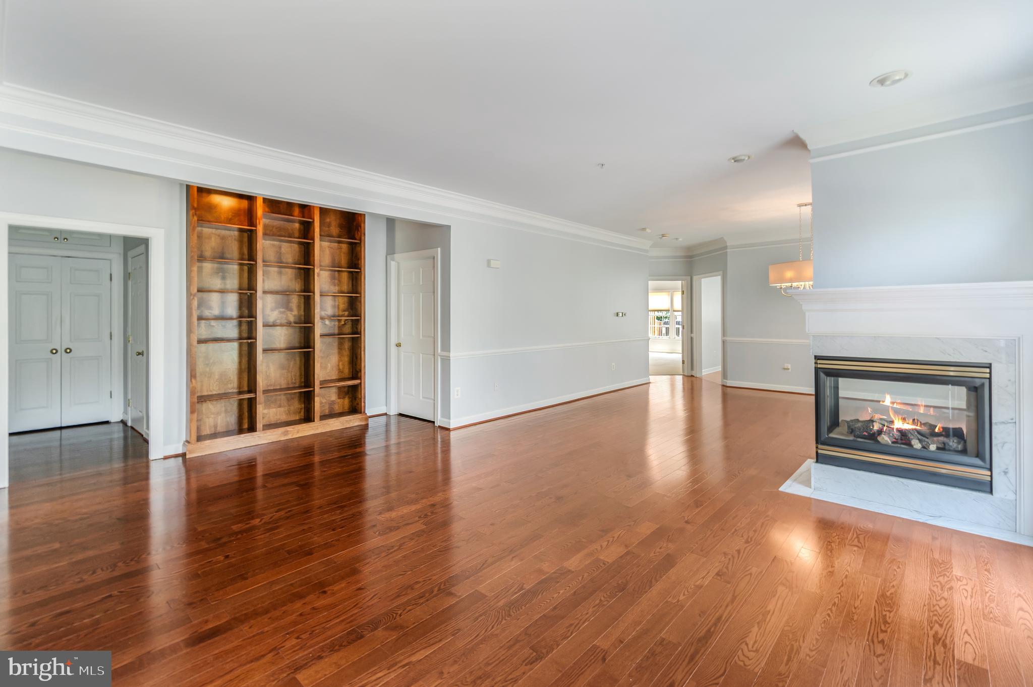 314 Colony Point Place Edgewater, MD 21037 - Photo 6 of 31 wooden floor in an empty room with a window