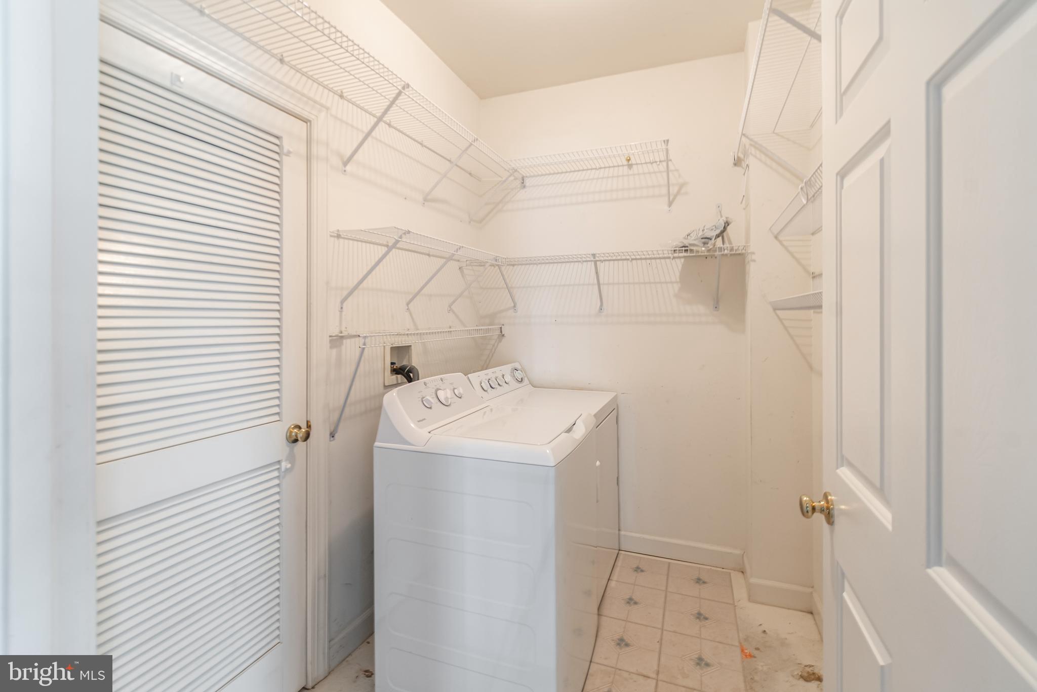 314 Colony Point Place Edgewater, MD 21037 - Photo 10 of 31 a utility room with dryer and washer