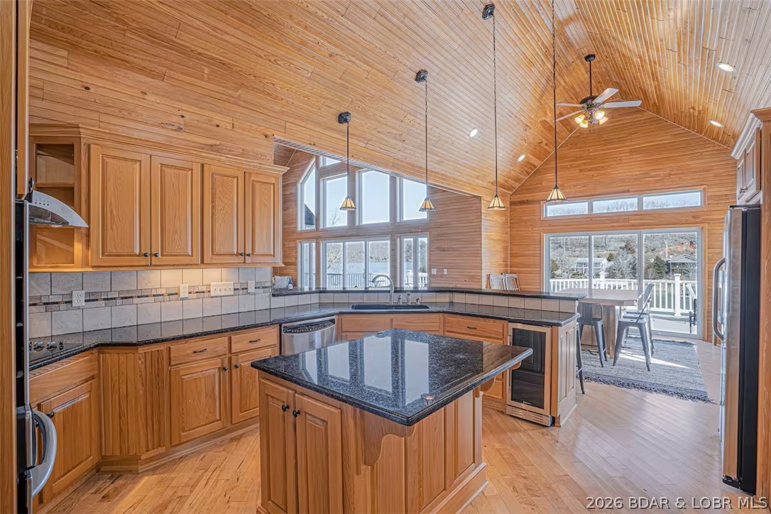 575 Graceland Point Climax Springs, MO 65324 - Photo 14 of 59 Kitchen also enjoys lake views through the living