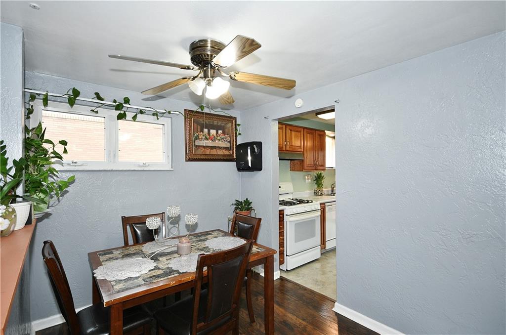 1619 Hollyrood Road Pittsburgh, PA 15227 - Photo 11 of 25 a view of a dining room with furniture and window