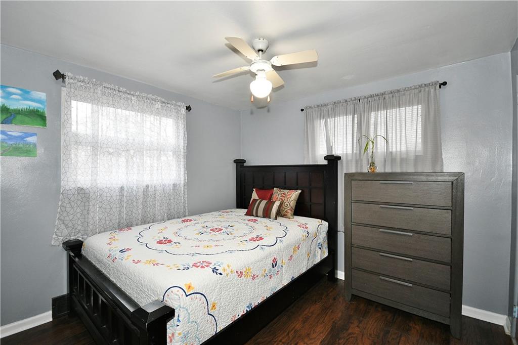 1619 Hollyrood Road Pittsburgh, PA 15227 - Photo 14 of 25 a bedroom with a bed and a ceiling fan