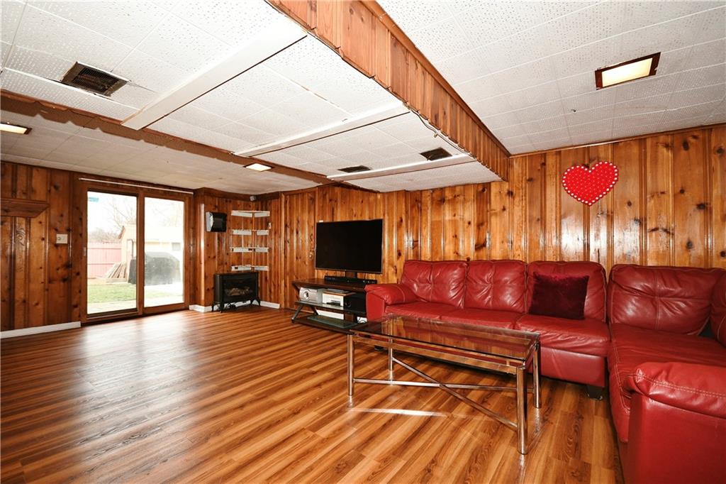 1619 Hollyrood Road Pittsburgh, PA 15227 - Photo 18 of 25 a living room with furniture and wooden floor