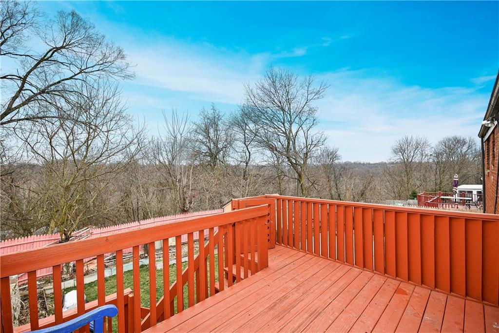 1619 Hollyrood Road Pittsburgh, PA 15227 - Photo 23 of 25 a view of deck with large trees and wooden fence