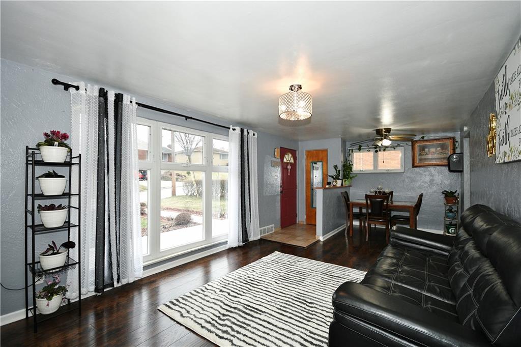 1619 Hollyrood Road Pittsburgh, PA 15227 - Photo 4 of 25 a living room with furniture and wooden floor