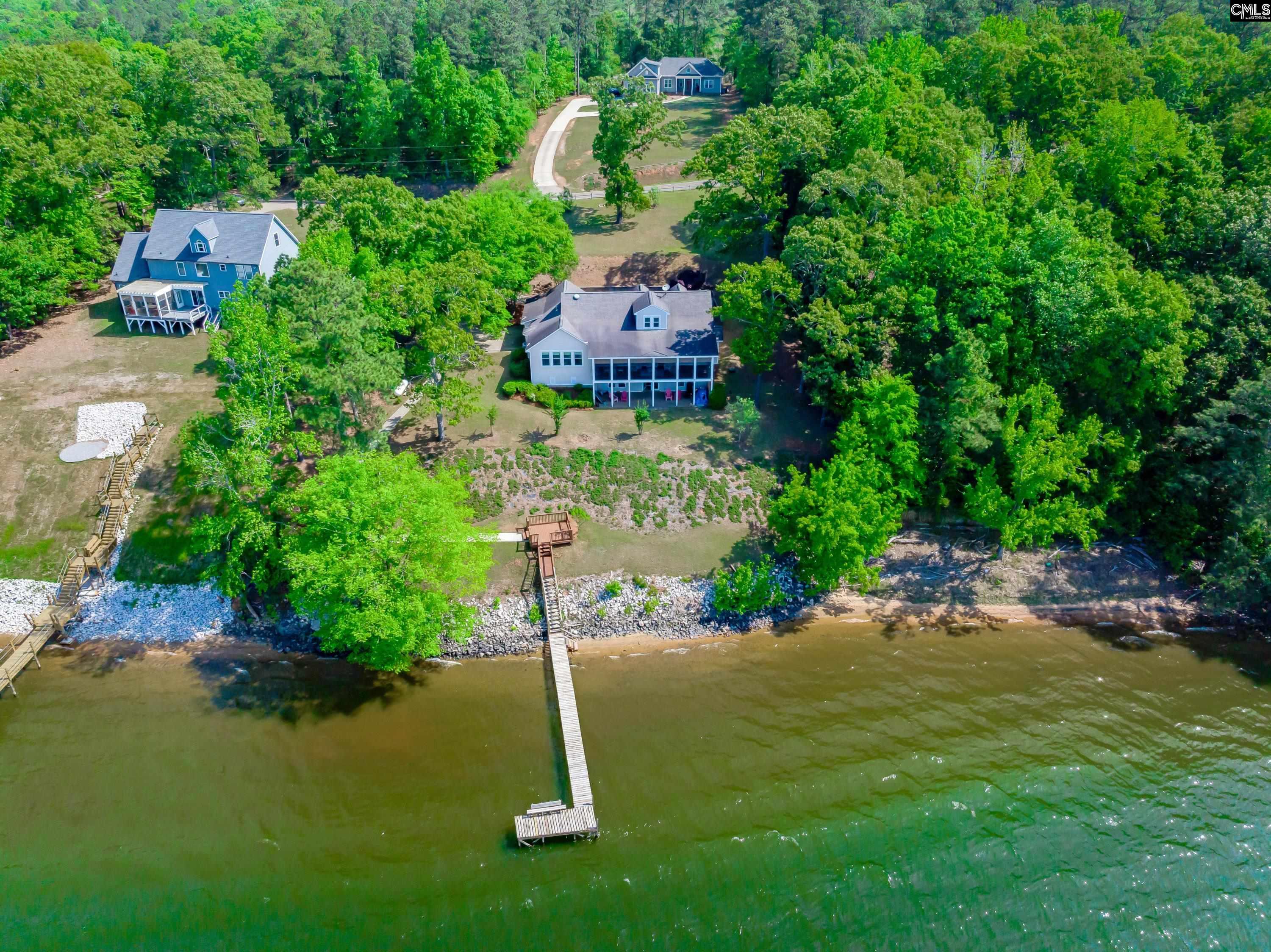 2577 Harbor View Road Camden, SC 29020 - Photo 3 of 42 an aerial view of a house with a yard basket ball court and outdoor seating