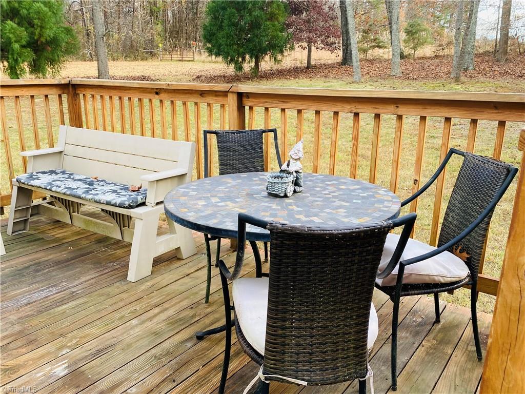 2811 Regal Road Reidsville, NC 27320 - Photo 8 of 19 Dining and kitchen area opens to back deck