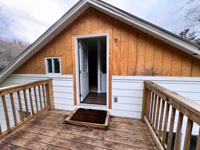 a view of a house with a deck