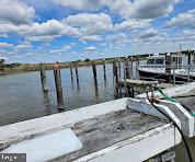 204 Bridgeton Avenue Fortescue, NJ 08321 - Photo 17 of 17 a view of roof deck with two chairs