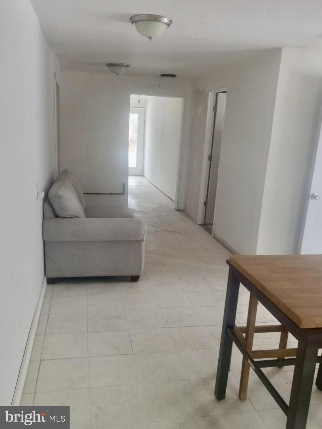 204 Bridgeton Avenue Fortescue, NJ 08321 - Photo 7 of 17 a living room with furniture and a window
