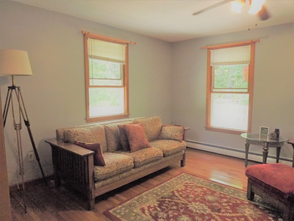 343 Cedar Swamp Road Monson, MA 01057 - Photo 4 of 24 a living room with furniture and a window