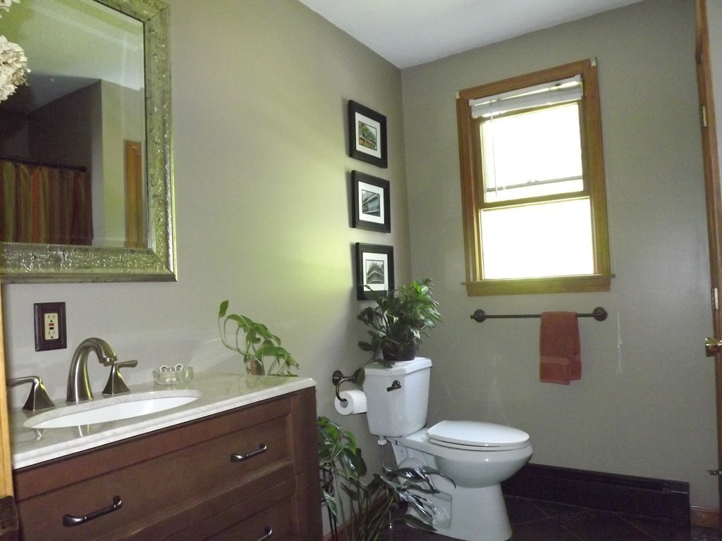 343 Cedar Swamp Road Monson, MA 01057 - Photo 7 of 24 a bathroom with a toilet sink and mirror