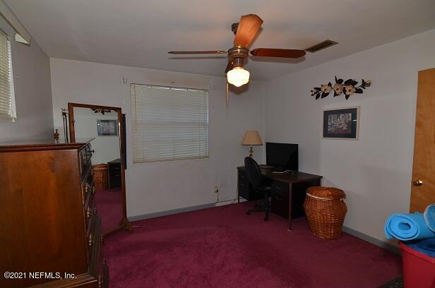 6324 Anvil Road Jacksonville, FL 32277 - Photo 27 of 34 a living room with furniture