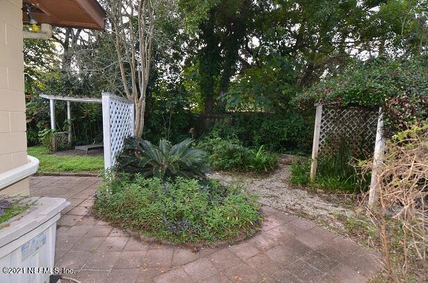 6324 Anvil Road Jacksonville, FL 32277 - Photo 31 of 34 a front view of a house with garden
