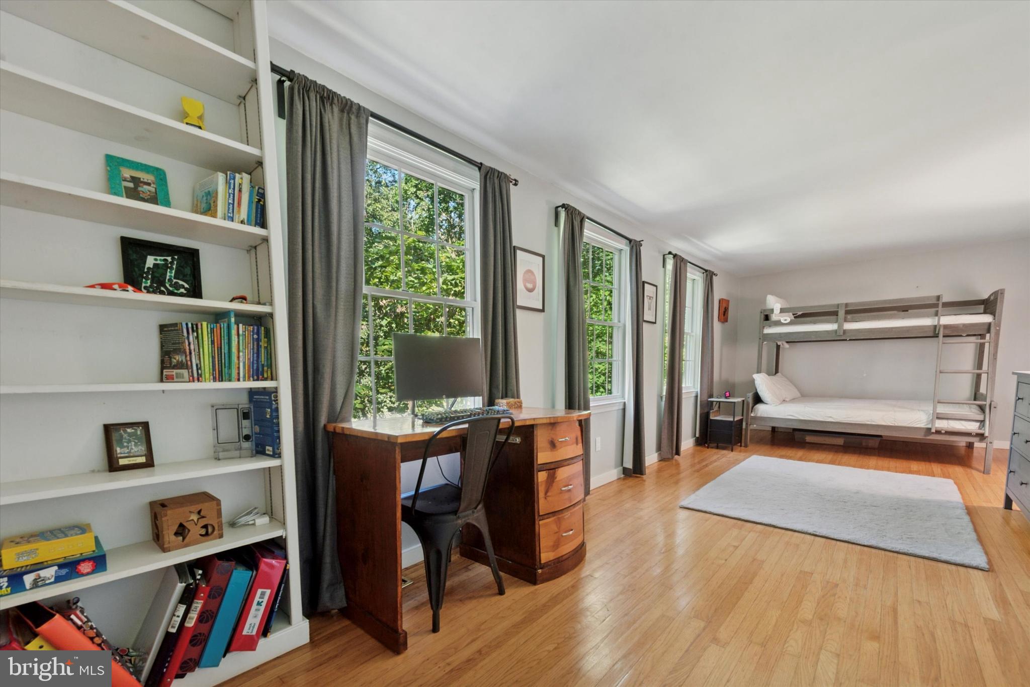 103 Deepdale Road Wayne, PA 19087 - Photo 20 of 41 a bedroom with furniture and a book shelf