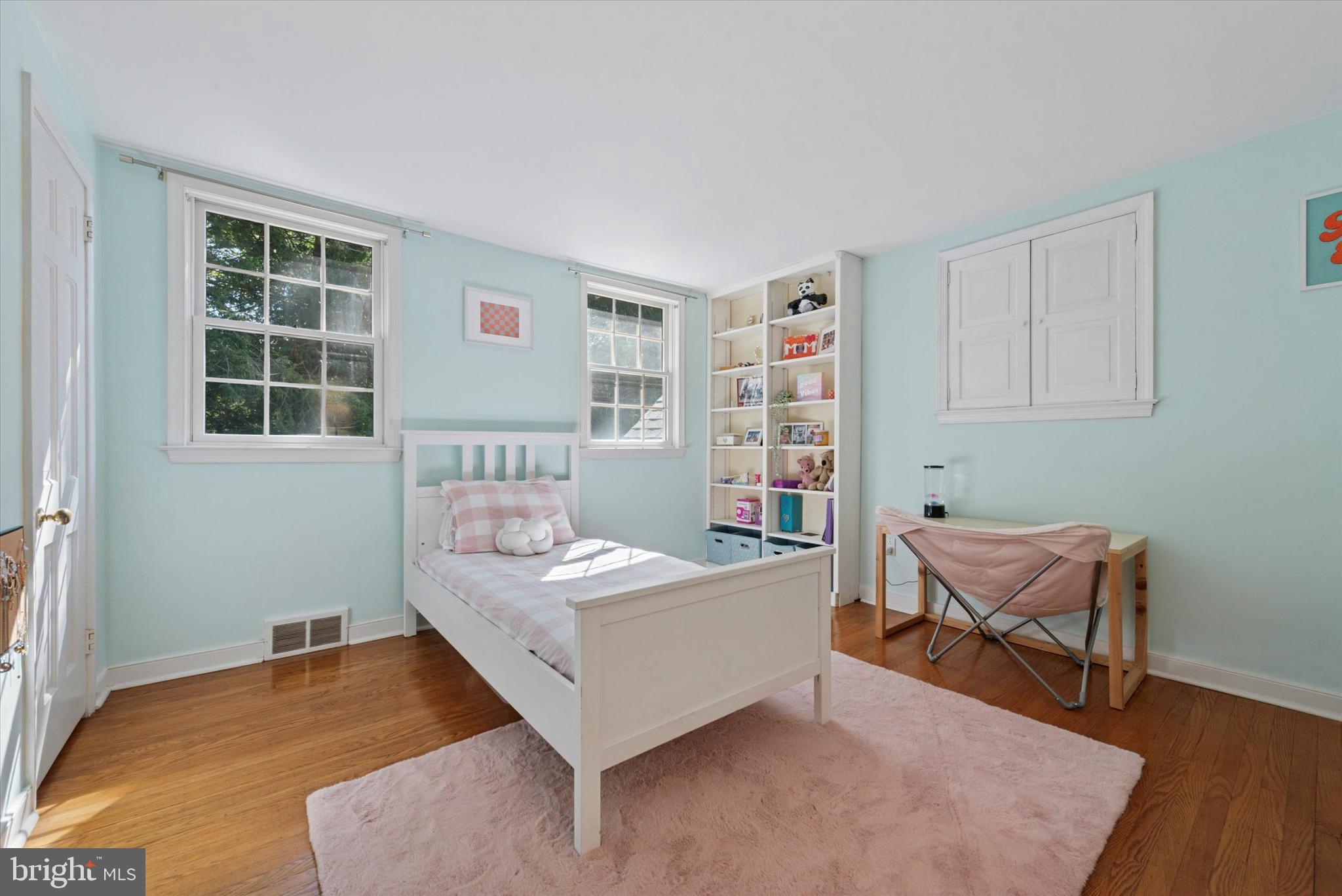 103 Deepdale Road Wayne, PA 19087 - Photo 22 of 41 a bedroom with a bed and a couch