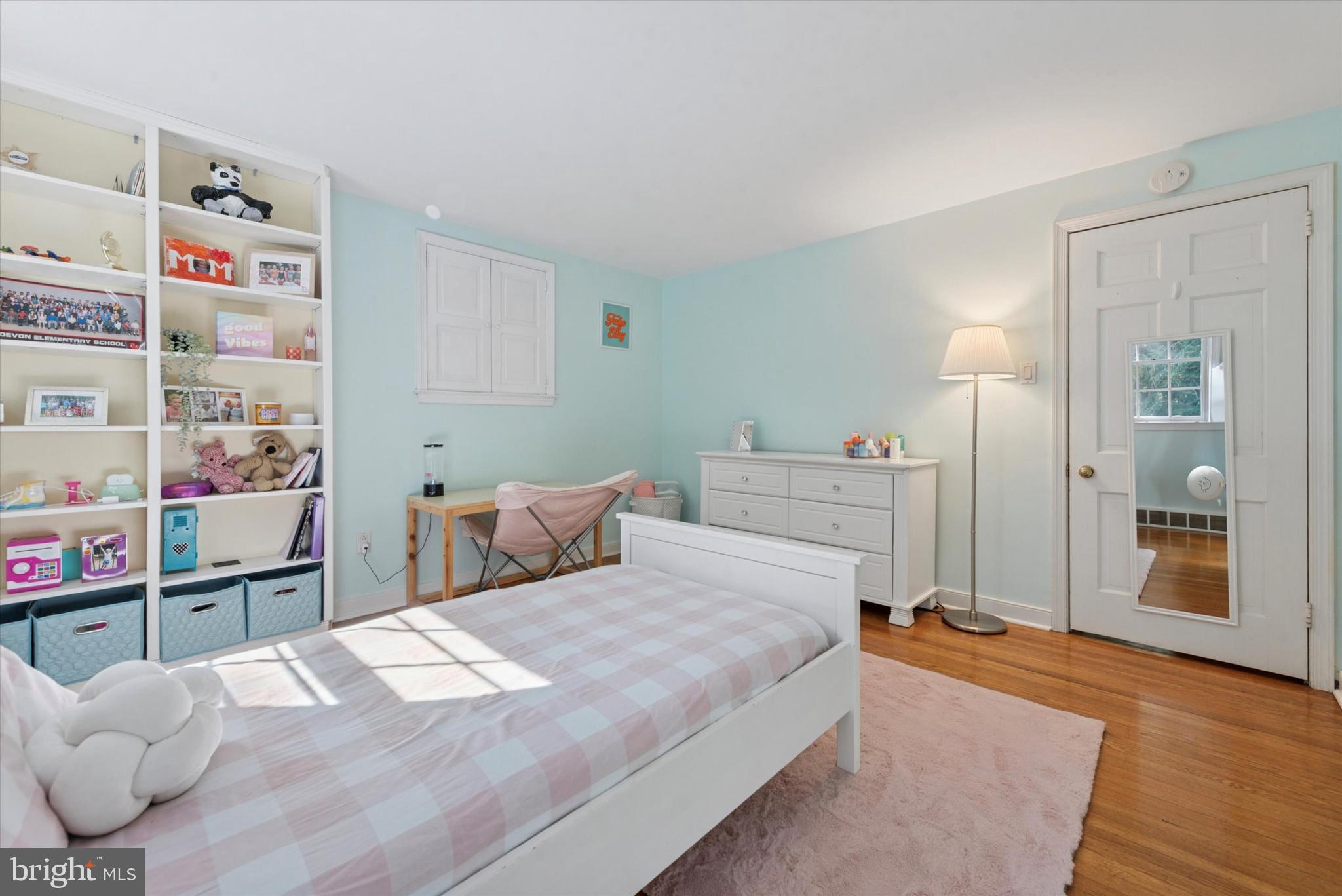 103 Deepdale Road Wayne, PA 19087 - Photo 23 of 41 a bedroom with a bed and a dresser with wooden floor