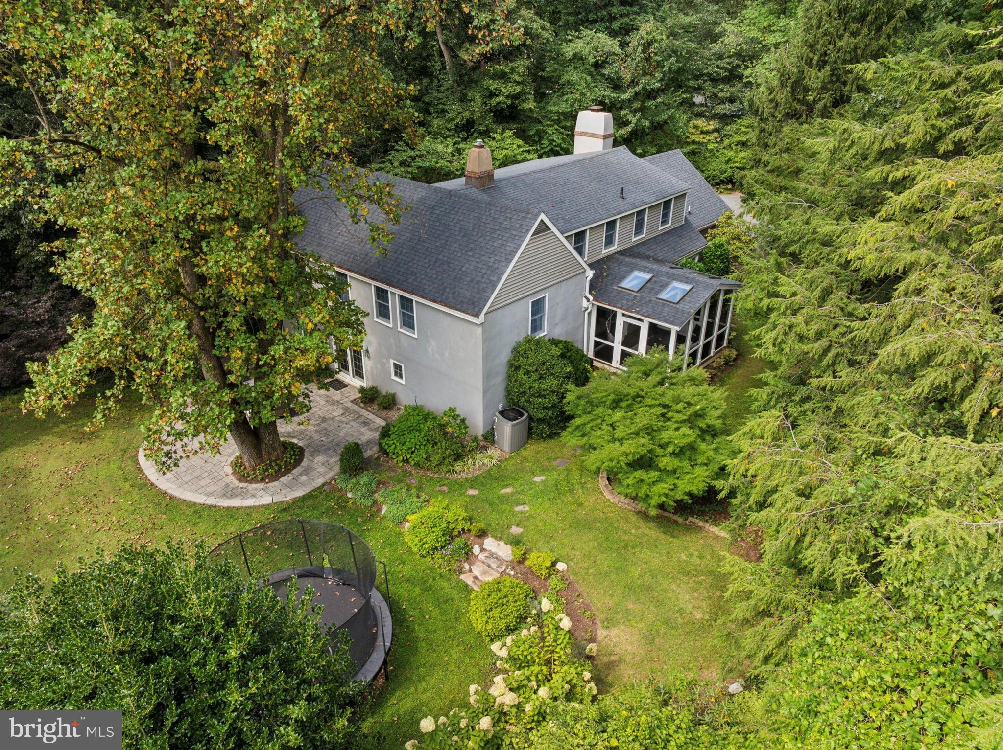 103 Deepdale Road Wayne, PA 19087 - Photo 31 of 41 an aerial view of a house with swimming pool and garden