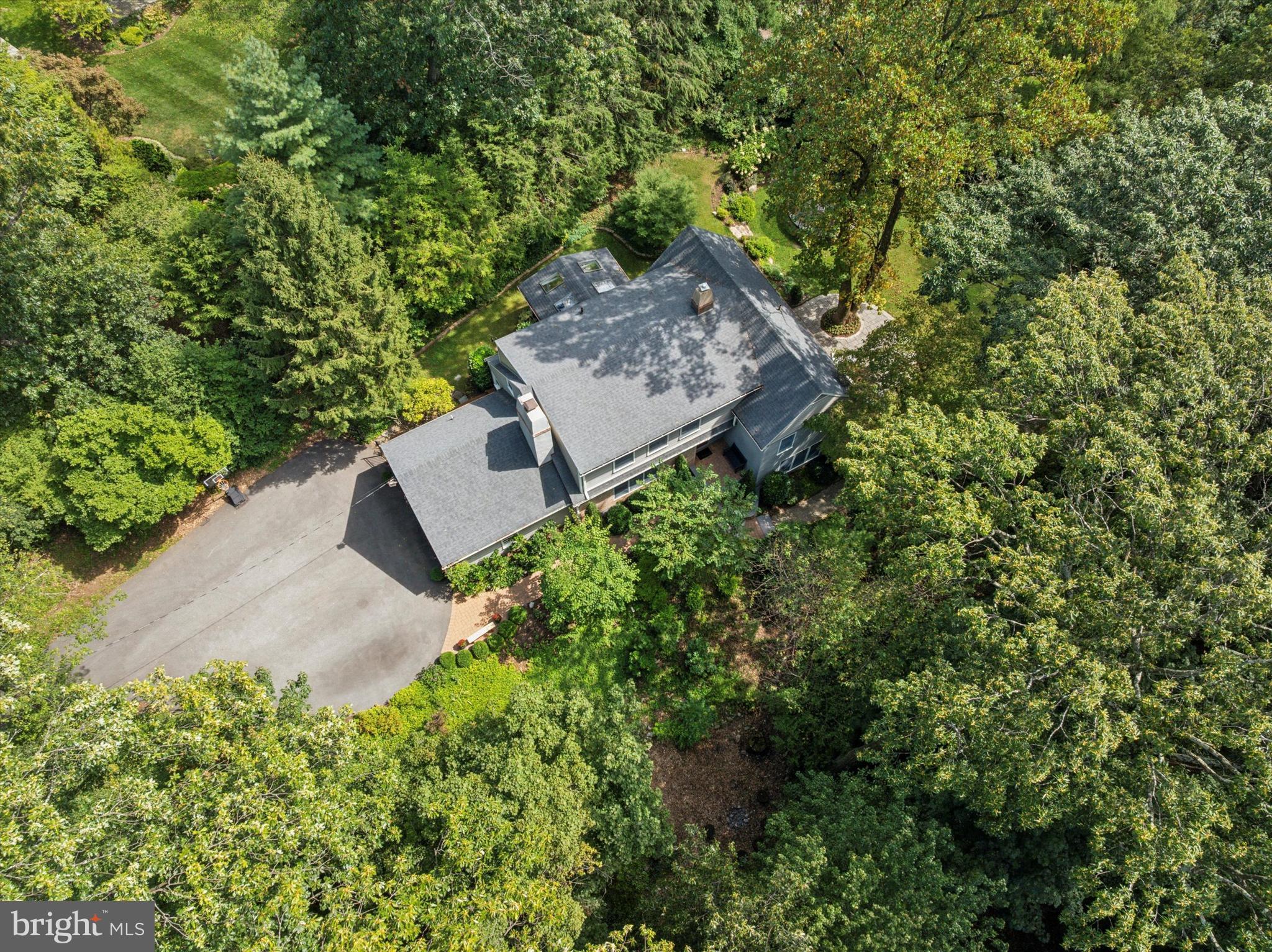 103 Deepdale Road Wayne, PA 19087 - Photo 36 of 41 an aerial view of a house with a yard and large tree