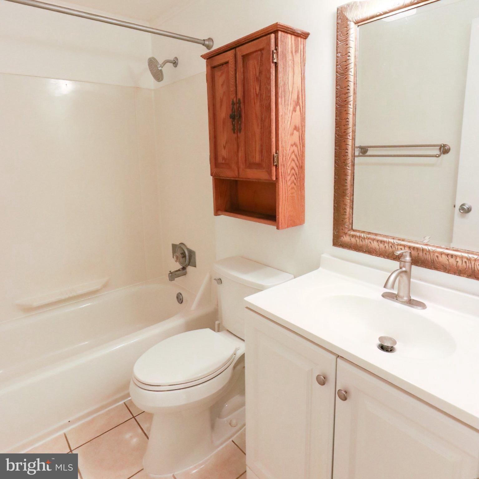 10704 Lester Street Silver Spring, MD 20902 - Photo 17 of 21 Charming bathroom with modern touches.