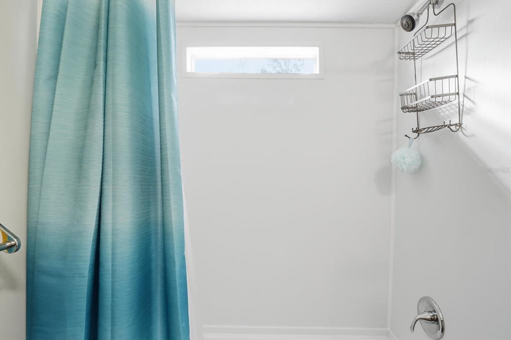 7305 South Threshold Point Homosassa, FL 34446 - Photo 18 of 46 a close view of shower tap