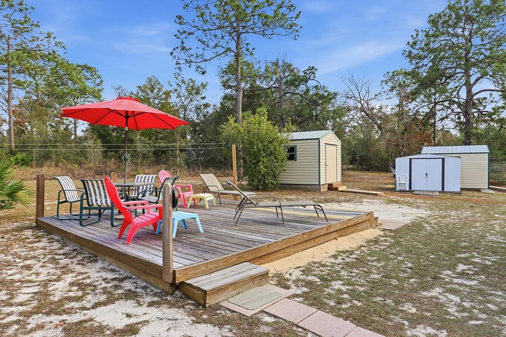 7305 South Threshold Point Homosassa, FL 34446 - Photo 33 of 46 a view of a terrace with sitting area