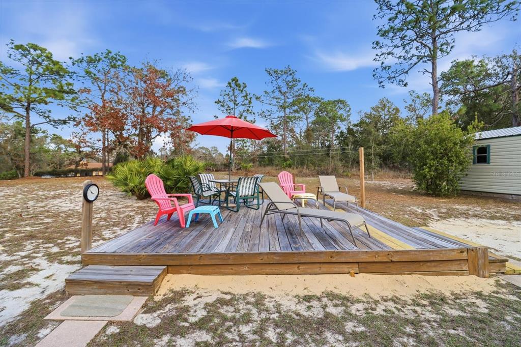 7305 South Threshold Point Homosassa, FL 34446 - Photo 34 of 46 swimming pool view with a seating space