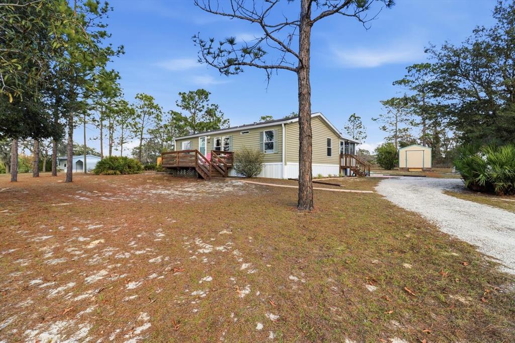 7305 South Threshold Point Homosassa, FL 34446 - Photo 38 of 46 a view of a house with a street