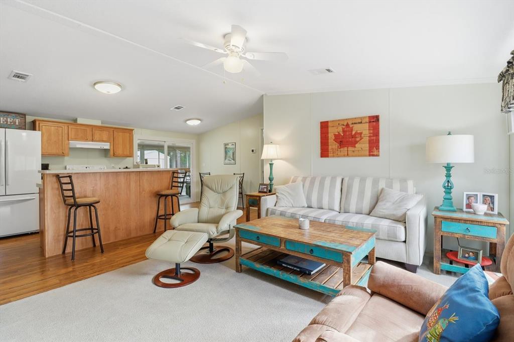 7305 South Threshold Point Homosassa, FL 34446 - Photo 4 of 46 a living room with furniture and a wooden floor