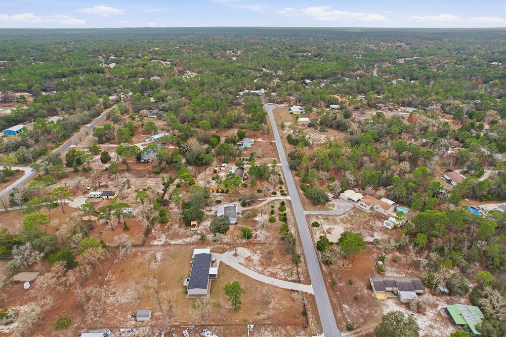 7305 South Threshold Point Homosassa, FL 34446 - Photo 44 of 46 an aerial view of residential houses with outdoor space