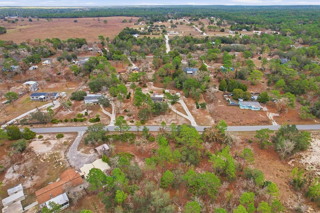 7305 South Threshold Point Homosassa, FL 34446 - Photo 46 of 46 an aerial view of residential houses with outdoor space