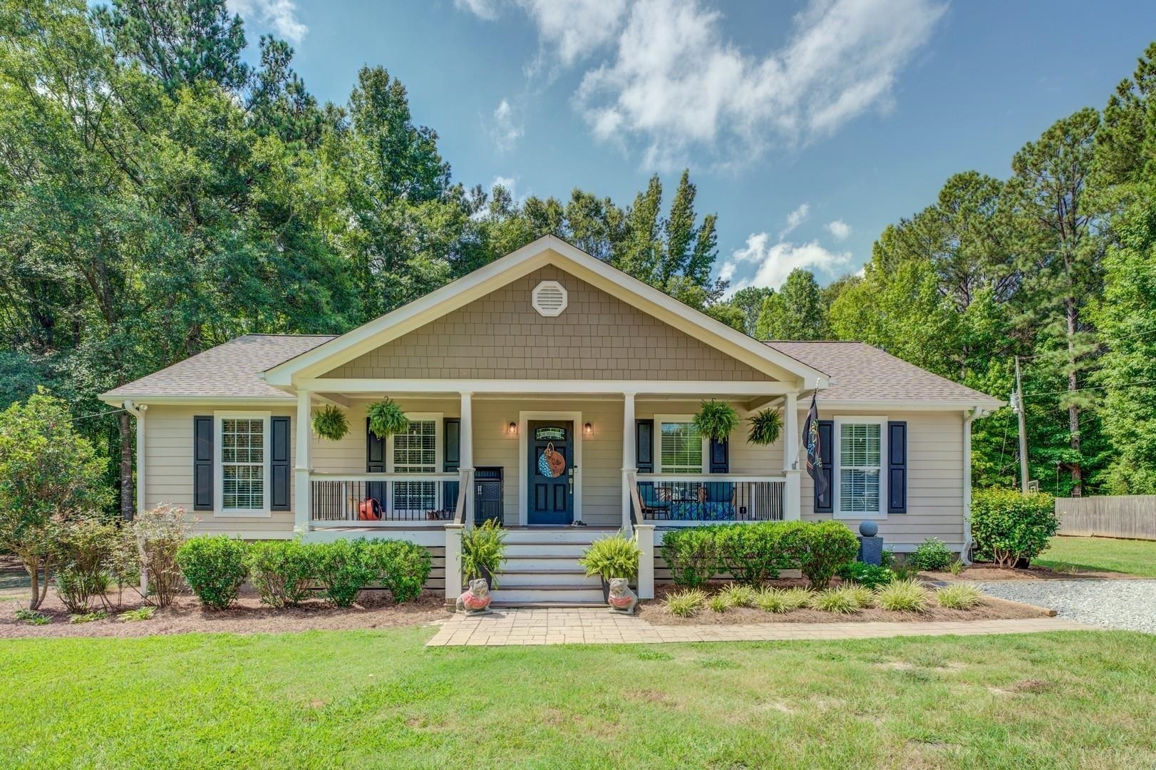 front view of a house with a yard