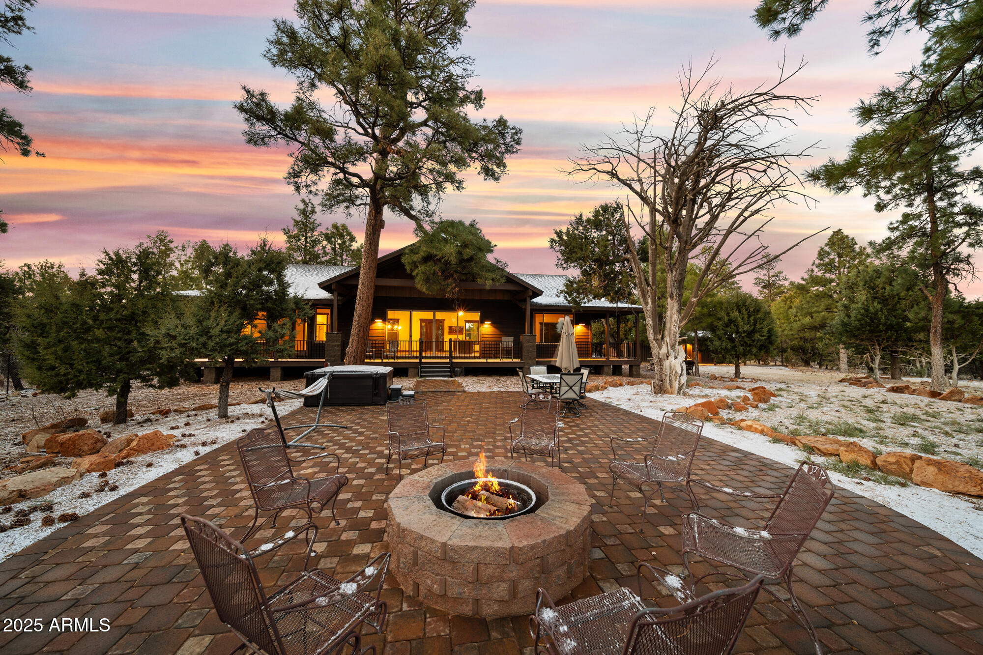 2702 Majestic Elk Road Overgaard, AZ 85933 - Photo 30 of 89 Backyard/Fireplace-Twilight