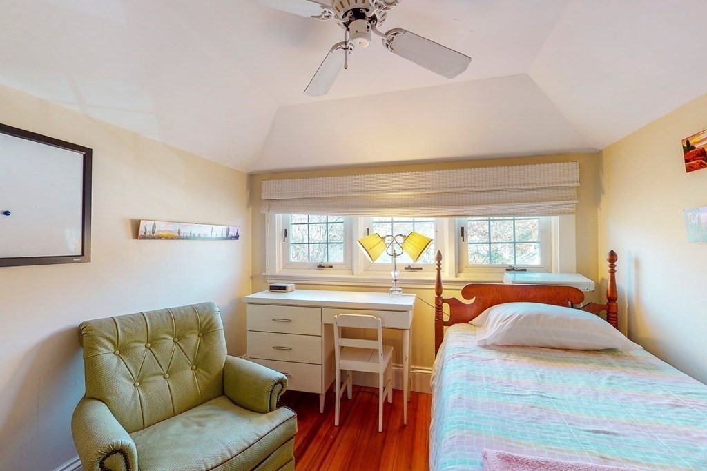 246 Clark Road Brookline, MA 02445 - Photo 16 of 18 a living room with furniture and a fireplace