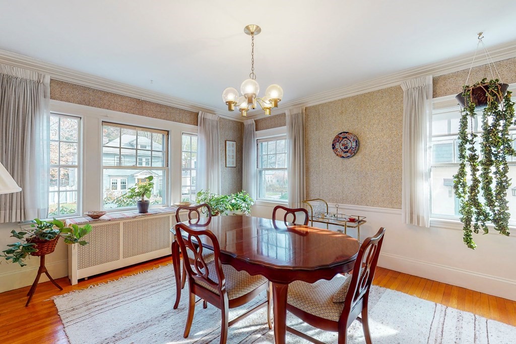 246 Clark Road Brookline, MA 02445 - Photo 5 of 18 a view of a dining room with furniture window and wooden floor