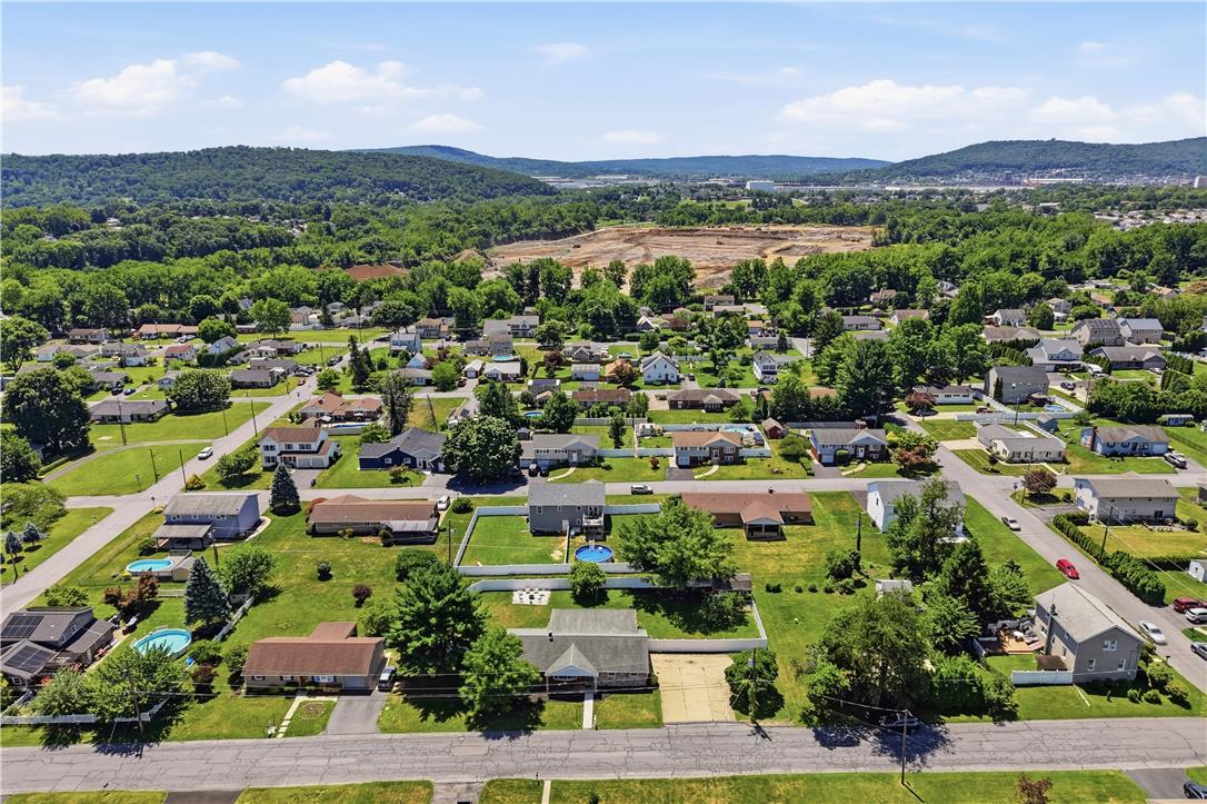 2918 Keystone Street Bethlehem, PA 18020 - Photo 51 of 54 An aerial perspective reveals a residential community nestled among verdant hills, featuring numerous homes with well-maintained yards.