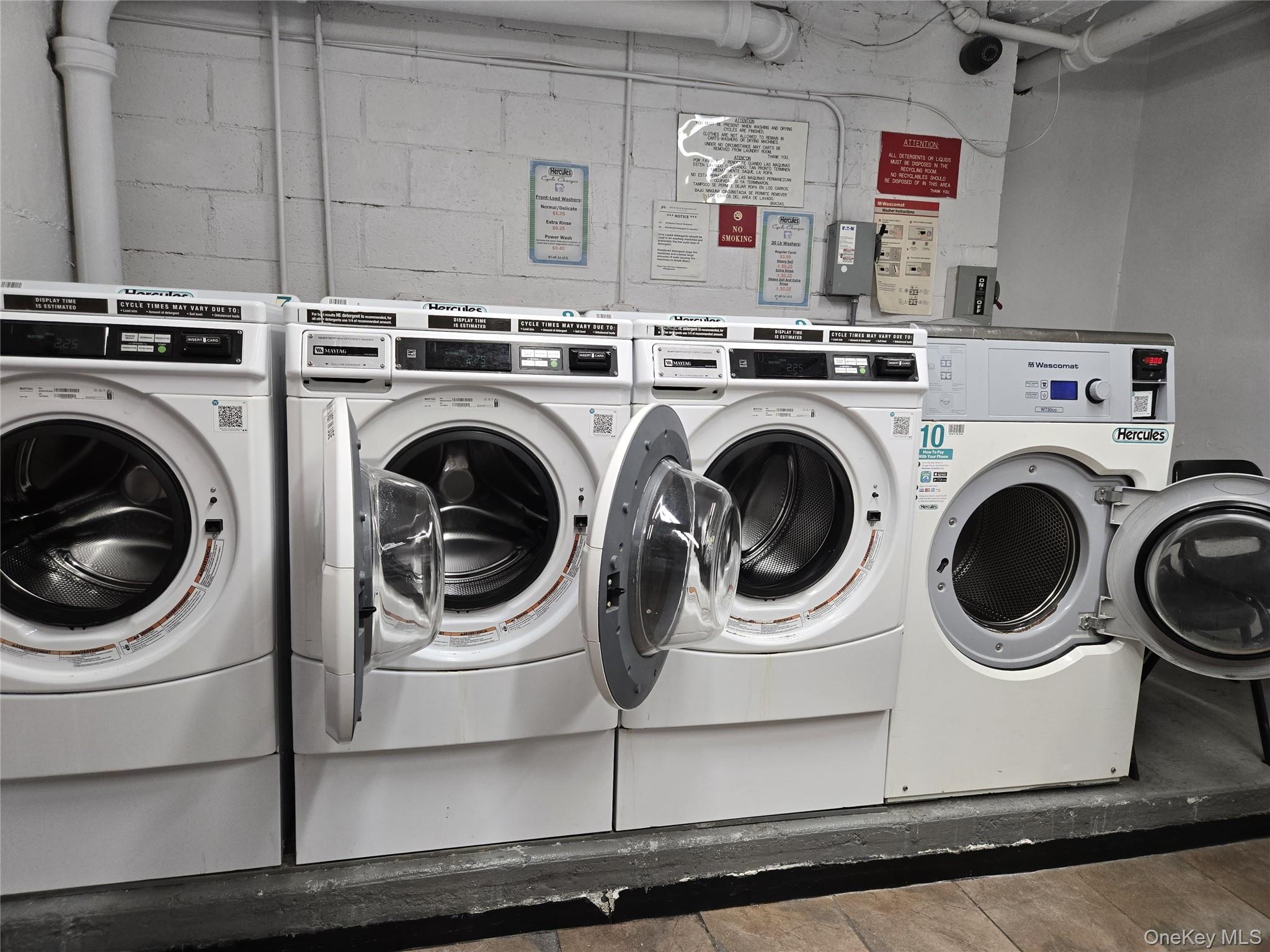 87-09 34th Avenue, Unit 6K Queens, NY 11372 - Photo 3 of 12 a utility room with dryer and washer