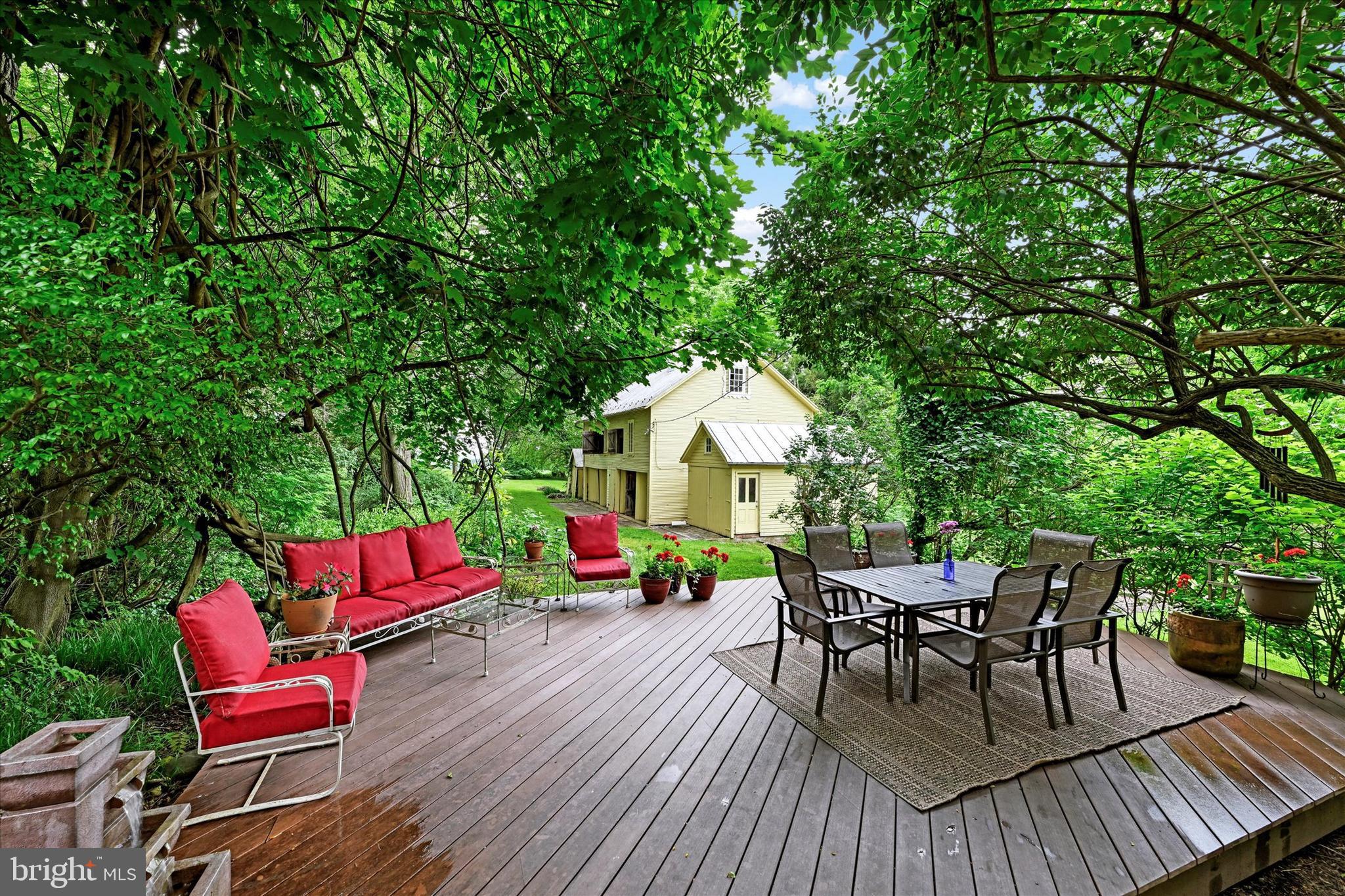 3341 Uniontown Road Westminster, MD 21158 - Photo 31 of 54 Rear Trex deck, outbuildings beyond