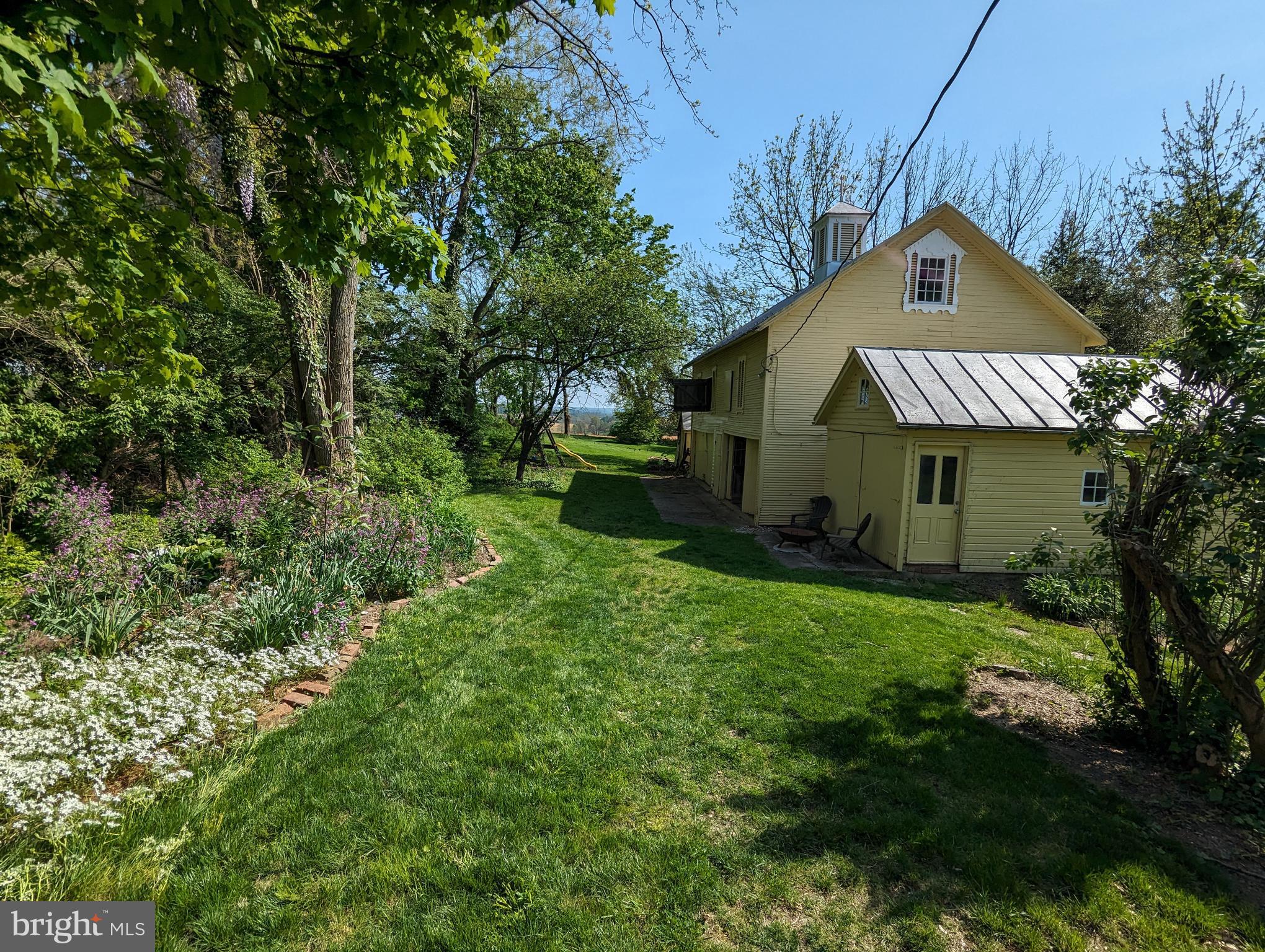3341 Uniontown Road Westminster, MD 21158 - Photo 34 of 54 Rear yard showing perennial gardens & outbuildings