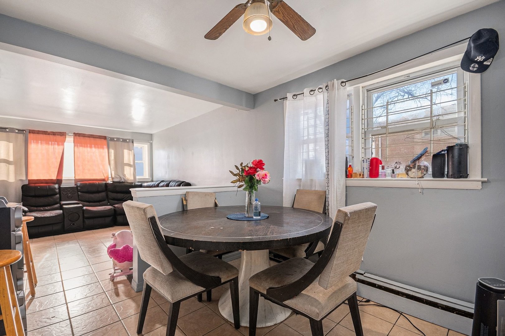 7524 West 63rd Place Summit, IL 60501 - Photo 2 of 2 a view of a dining room with furniture and window