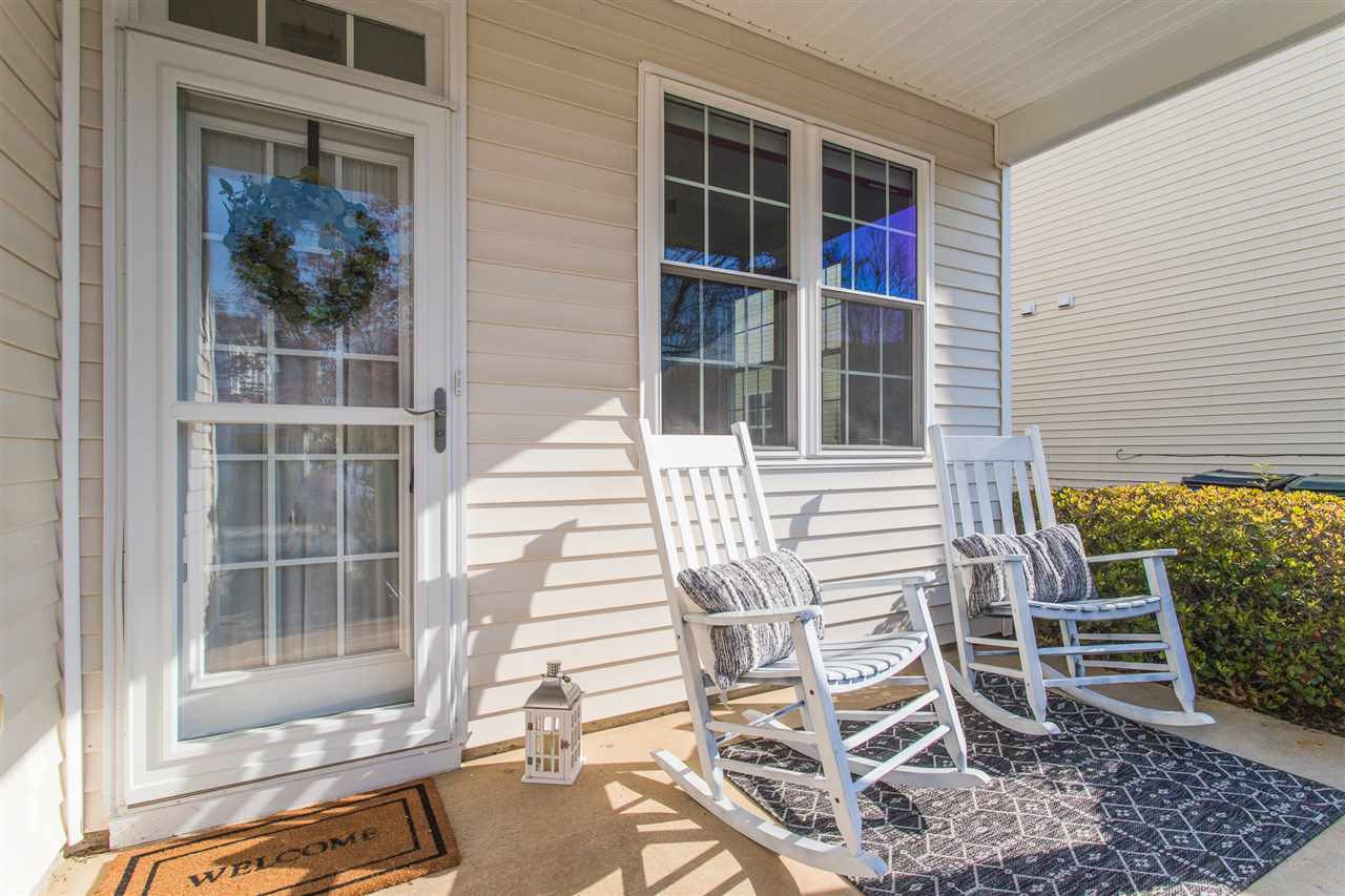 8512 Micollet Court Raleigh, NC 27613 - Photo 2 of 20 Covered Rocking Chair Porch