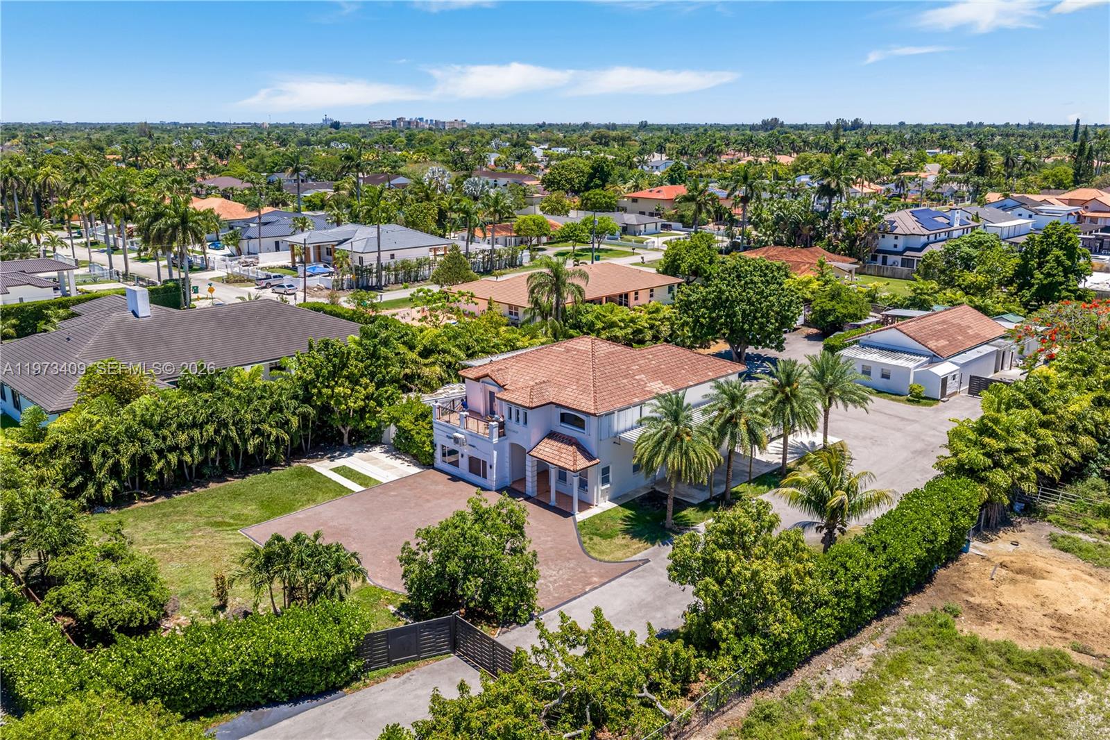 13050 Southwest 26th Street Miami, FL 33175 - Photo 40 of 43 an aerial view of residential houses with outdoor space and river